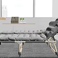 Gray Folding Beds In Office With Wooden Desk And White Cabinets