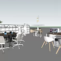 Outdoor Open Workspace Desk With Laptops People Plants And Blue Sky Clouds