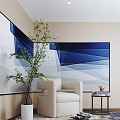 Modern Single Sofa Interior Featuring Blue White Geometric Wall Art Green Plant And Side Table