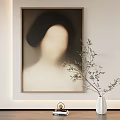 Interior Decor Featuring Blurred Female Portrait On Wall White Vase With Green Branches