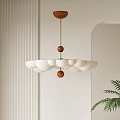 Modern White Chandelier With Wooden Accents In Minimalist Interior Space