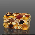 Amber Colored Nut And Dried Fruit Pastry Block With Mixed Nuts Raisins And Seeds