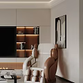 Modern Living Room With White And Brown Leather Massage Chair And Decorative Wall Art