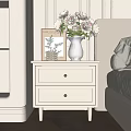 Two Drawer White Chest Of Drawers In Modern Bedroom With Vase Flowers And Artwork
