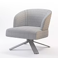 Gray Upholstered Armchair With Curved Backrest And Star Shaped Metal Base