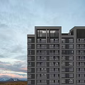 Modern High Rise Residential Building With Large Windows And Balconies Overlooking City View