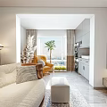Elegant Modern Open Living And Dining Room With Sofa Dining Table And Decorative Lighting