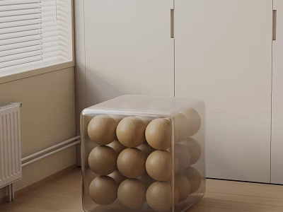 Transparent Cube Side Table With Wooden Balls In Room With White Cabinets And Window 3d model