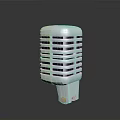 Retro Style Vintage Microphone With Chrome Grid Design On Black Background