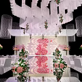 Banquet Hall Interior With Curved White Strip Ceiling And Pink White Flower Arrangements