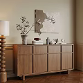 Cozy Living Space With Wooden Cabinet Floor Lamp And Wall Art Decorations