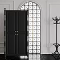 Elegant Black Decorative Cabinet With Brass Handles White Walls Arched Geometric Window And Coat Rack