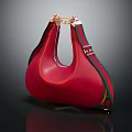 Red Leather Handbag Featuring Golden Metal Hardware And Green Red Striped Trim
