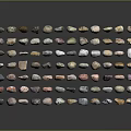 Natural Stone Pebbles In Various Colors And Shapes Arranged On Black Background