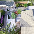 Rockery Stones In Modern Garden Landscape With Lush Plants And Pathways