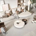 Beige Sectional Sofa With Decorative Pillows And Round Coffee Table Set In Modern Living Room