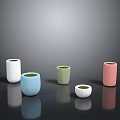 Five Colorful Cylindrical Vases On Black Smooth Surface With Gray Gradient Background