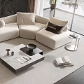 Modern White Sectional Sofa And Black Coffee Table Set With Decorative Pillows And Throw Blanket