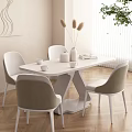 Modern White Dining Table Set With Beige Chairs Vase And Books On Wooden Floor