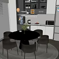 Round White Dining Table Set With Black Chairs And Green Plant In Modern Kitchen Interior