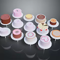 Assorted Colorful Decorated Small Cakes With Various Shapes And White Bases