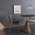 Modern Tea Table and Chairs with Round Top Conical Base Gray Wall Framed Artwork 3d model