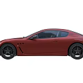 Red Maserati Sports Coupe With Sleek Design Black Wheels And Front Grille