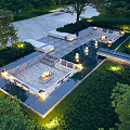 Outdoor Water Fountain Design With Garden Greenery Ambient Lighting Stone Seating And Marble Flooring