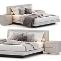 Modern Upholstered Double Bed With Gray White Bedding Pillows And Drawer Nightstands