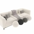 Elegant Modern Sofa In Neutral Colors With Decorative Pillows And Cozy Throw Blanket