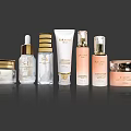 Luxury Beauty Cosmetics Collection With Gold Accents And Transparent Skincare Bottles