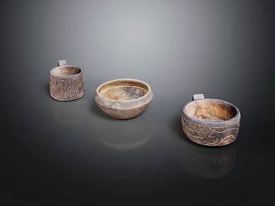 Three Carved Pattern Ceramic Cups Placed On Dark Background With Reflections 3d model