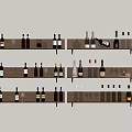 Three Wooden Shelves with Wine Bottles and Glasses on Light Colored Wall