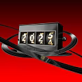 Creative Art Installation Featuring 2024 Flip Counter With Black Circular Rings On Red Background