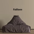 Poliform Dark Brown Fabric Bean Bag Chair With LV Logo On Beige Wall Wooden Floor