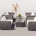 Gray Wicker Outdoor Sofa Set With White Cushions Coffee Table And Green Plant