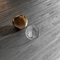 Elegant Wooden Flooring With Gold And Transparent Decorative Spheres In Modern Interior Design