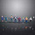 Various Male Figurines Of Different Professions Wearing Safety Helmets And Work Clothes