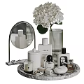 Bath and Daily Care Essentials on Vanity Tray with Mirror Candle and White Flowers