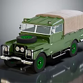 Classic Vintage Green Off Road Vehicle With Canvas Top And Front Spare Tire