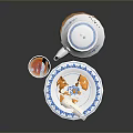 Blue And White Ceramic Tableware Set Including Teapot Teacup And Plate With Fruit Slices 3d model