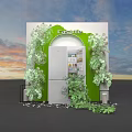 Casarte Display Area With Arched Door Green Plants And Silver Refrigerator Against Sky Sunset Background