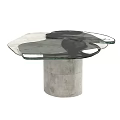 Modern Coffee Table Featuring Glass Top And Distressed Metal Pedestal With Unique Design