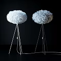 Modern White Floor Lamps With Fluffy Feather Shades On Black Background