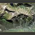Realistic Mountain Terrain Model with Green Vegetation Blue Lake and Winding Paths