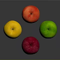 Four Colorful Apples in Yellow Red Pink and Green on Dark Background