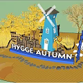Hygge Autumn Themed Photo Spot With Blue Windmill Yellow Trees Small House And Arch