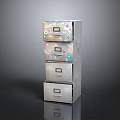 Silver Metal Drawer Cabinet With Multiple Stacked Drawers And Labeled Stickers