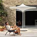 Outdoor Garden Canopy with Circular Platform Lush Green Plants and Seating Area