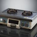 Two Burner Kitchen Appliance With Stainless Steel Surface And Control Knobs